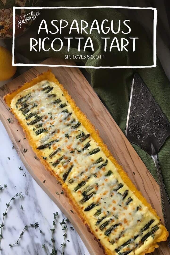This gluten-free savory Asparagus Ricotta Tart has a smooth ricotta filling & is topped with sauteed asparagus & cheesy mozzarella. #shelovesbiscotti #cornmealcrust #polentacrust #ricottatart #asparagustart #glutenfreetart #appetizer #ricotta #tart #polenta #cornmeal #asparagus #tart #ricotta #glutenfree #Italian