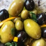 Black and green olives with orange zest and oregano.