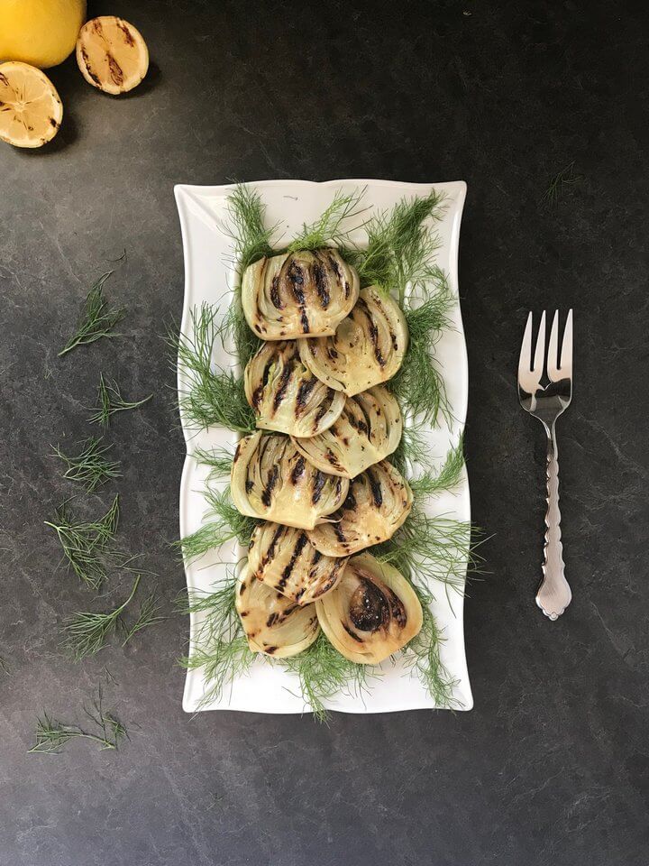 An overhead shot of grilled fennel, a unique grilling idea for indoor or outdoor grilling.