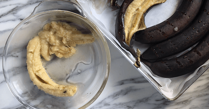 The interior of roasted bananas placed in a bowl.