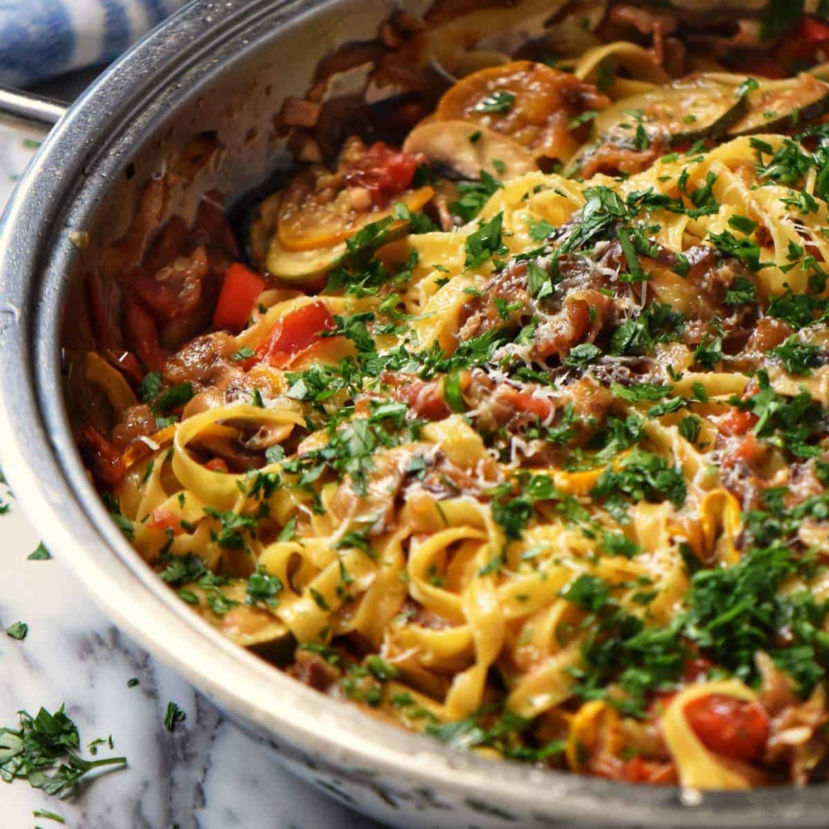 The grilled vegetables have been properly combined with the pasta.