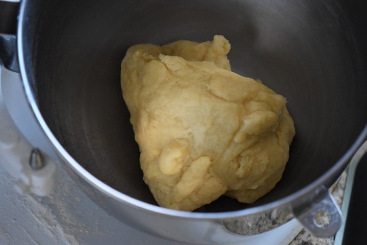 The dough to make the Caragnoli is properly combined as it is no longer stuck to the mixing bowl.