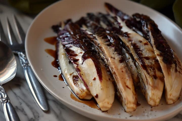 Grilled radicchio ready to be served as a side dish.