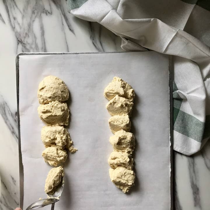 The two spoon method i used to portion the biscotti dough on the parchment lined cookie sheets.