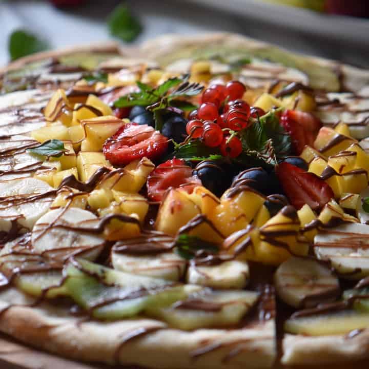 Peaches, strawberries, bananas and kiwis are just some of the fruits used for this chocolate fruit pizza