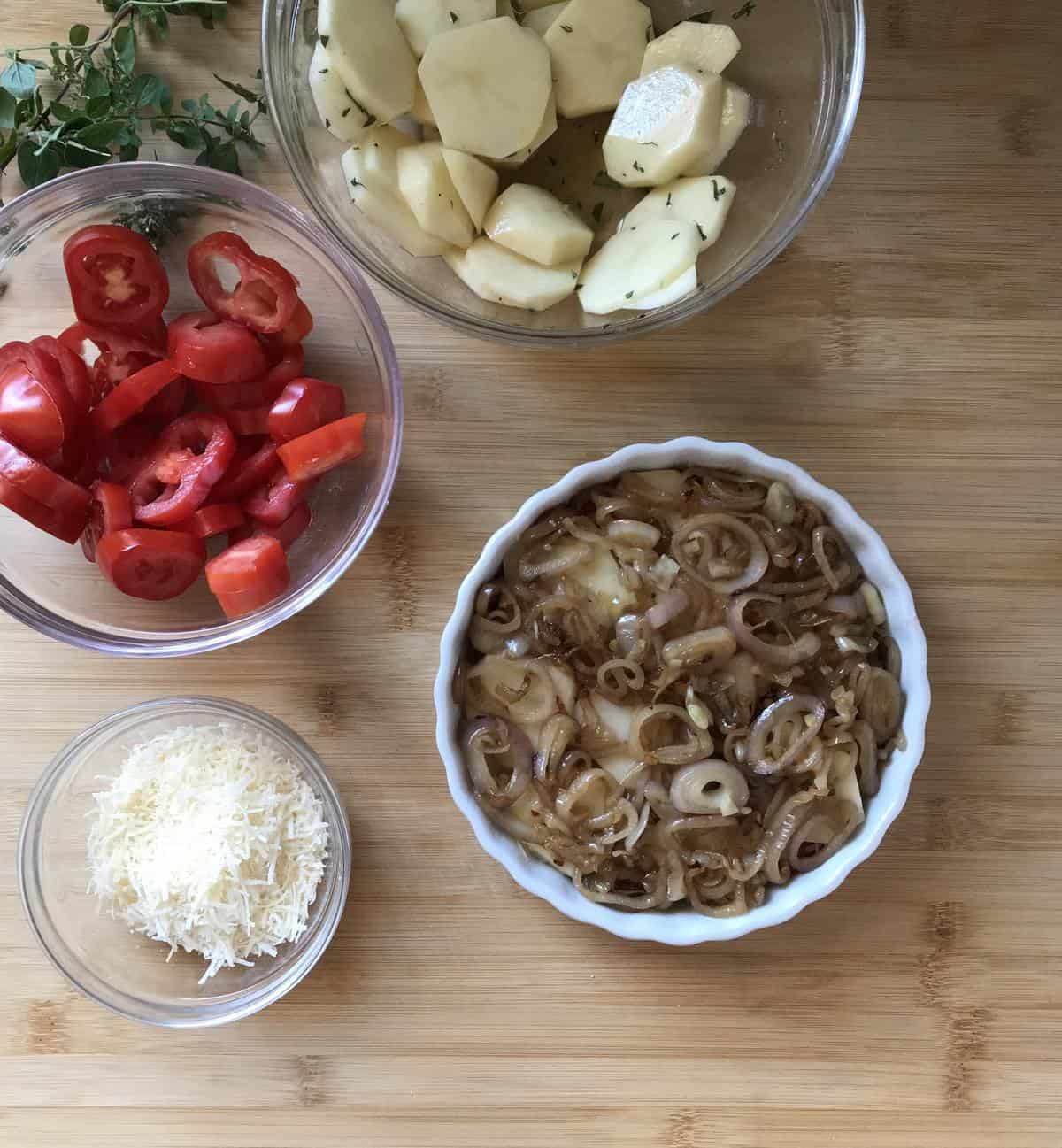 Sauteed shallots in a mixed vegetable bake.