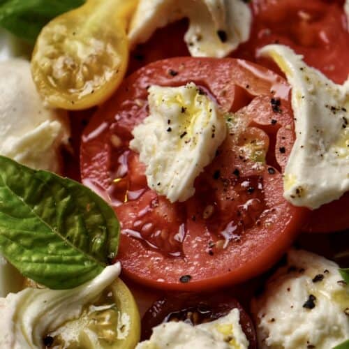A close up photo of Tomato Basil Mozzarella Salad.