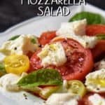 Sliced tomatoes, mozzarella cheese and basil leaves create the perfect caprese salad.