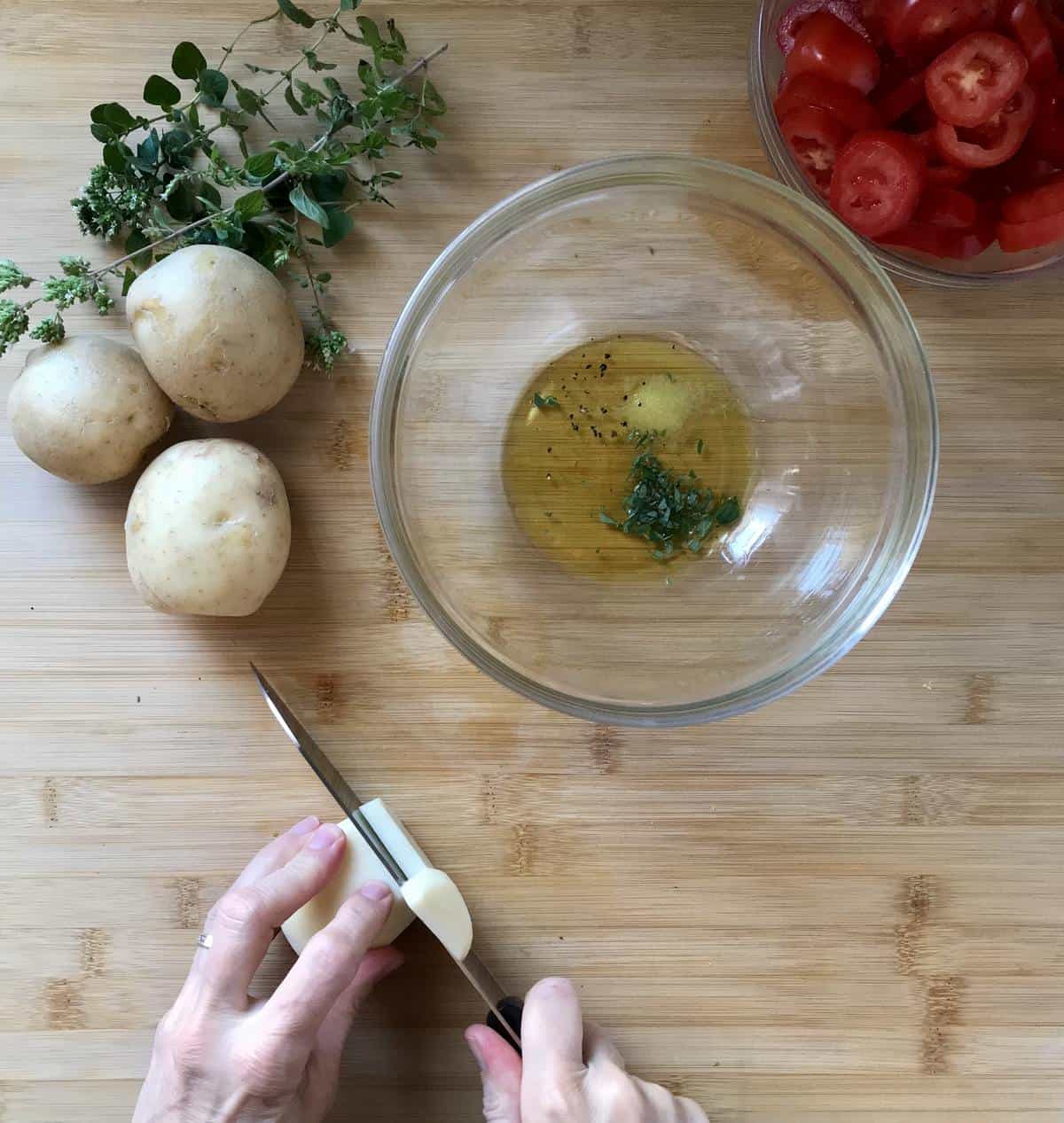 Yellow potatoes in the process of being sliced.