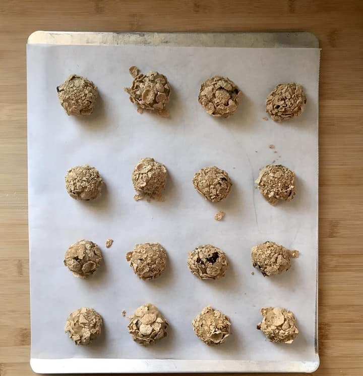 Oat Bran Cookies on a parchment lined baking sheet.