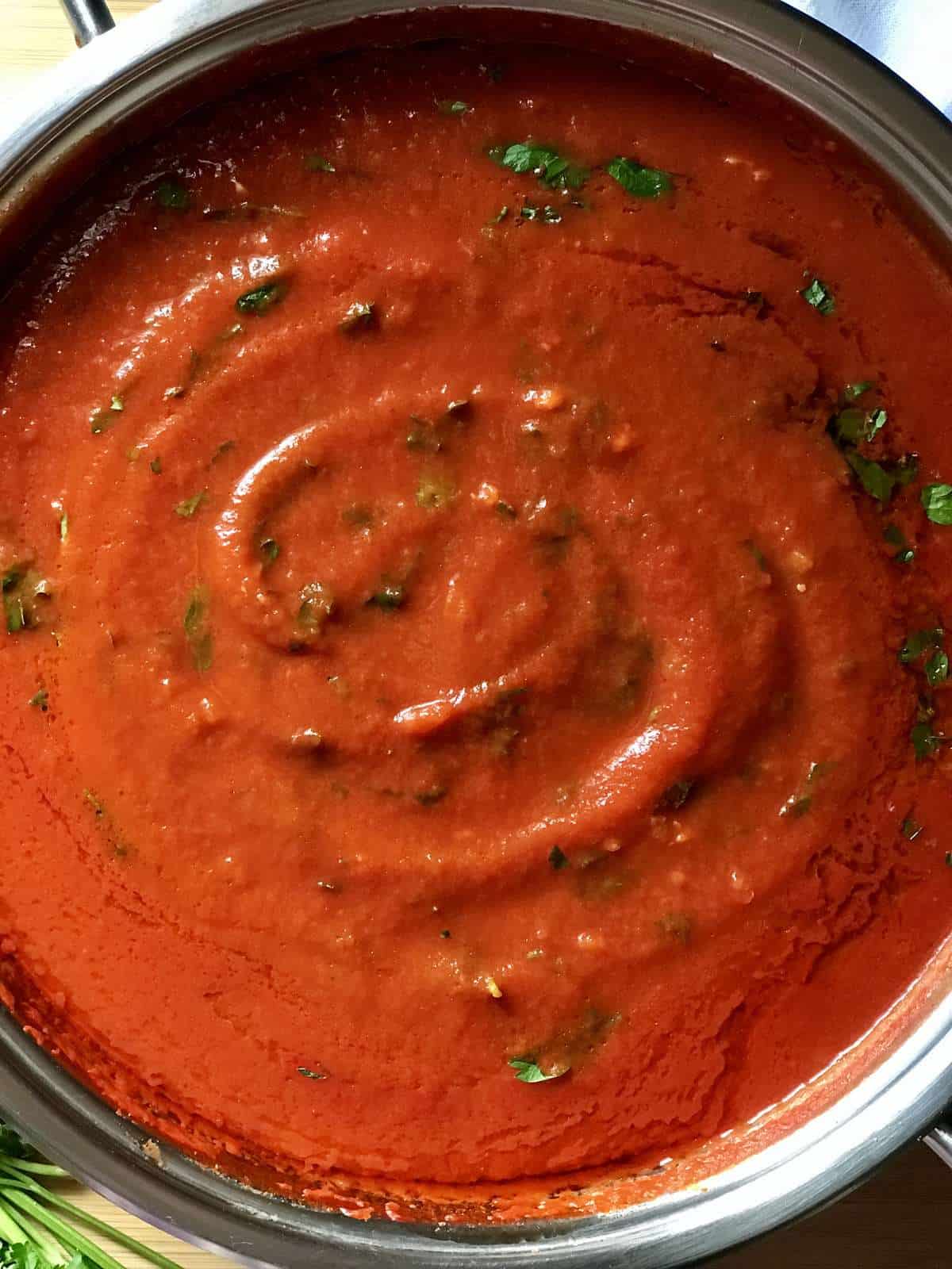 A large saucepan of tomato sauce.