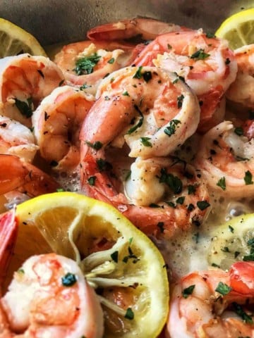 A pan of sauteed lemon garlic shrimp.
