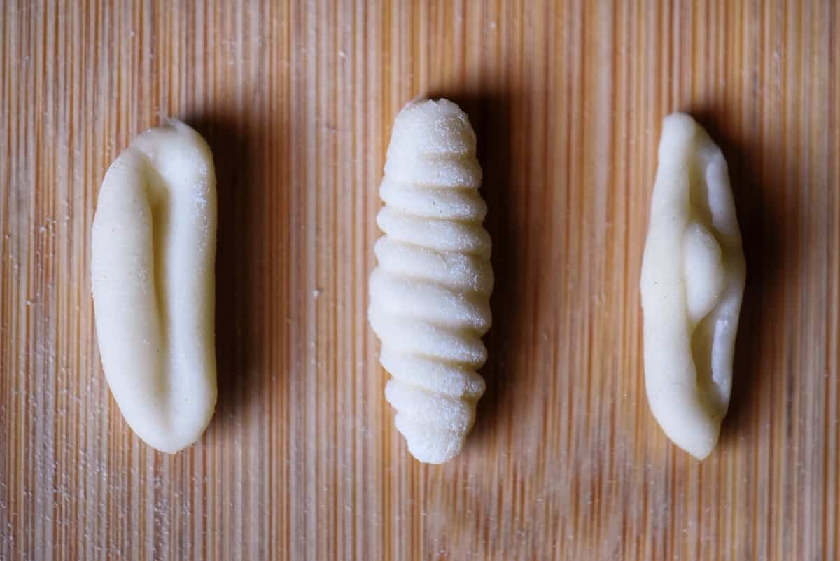 Three different shapes of cavatelli pasta.