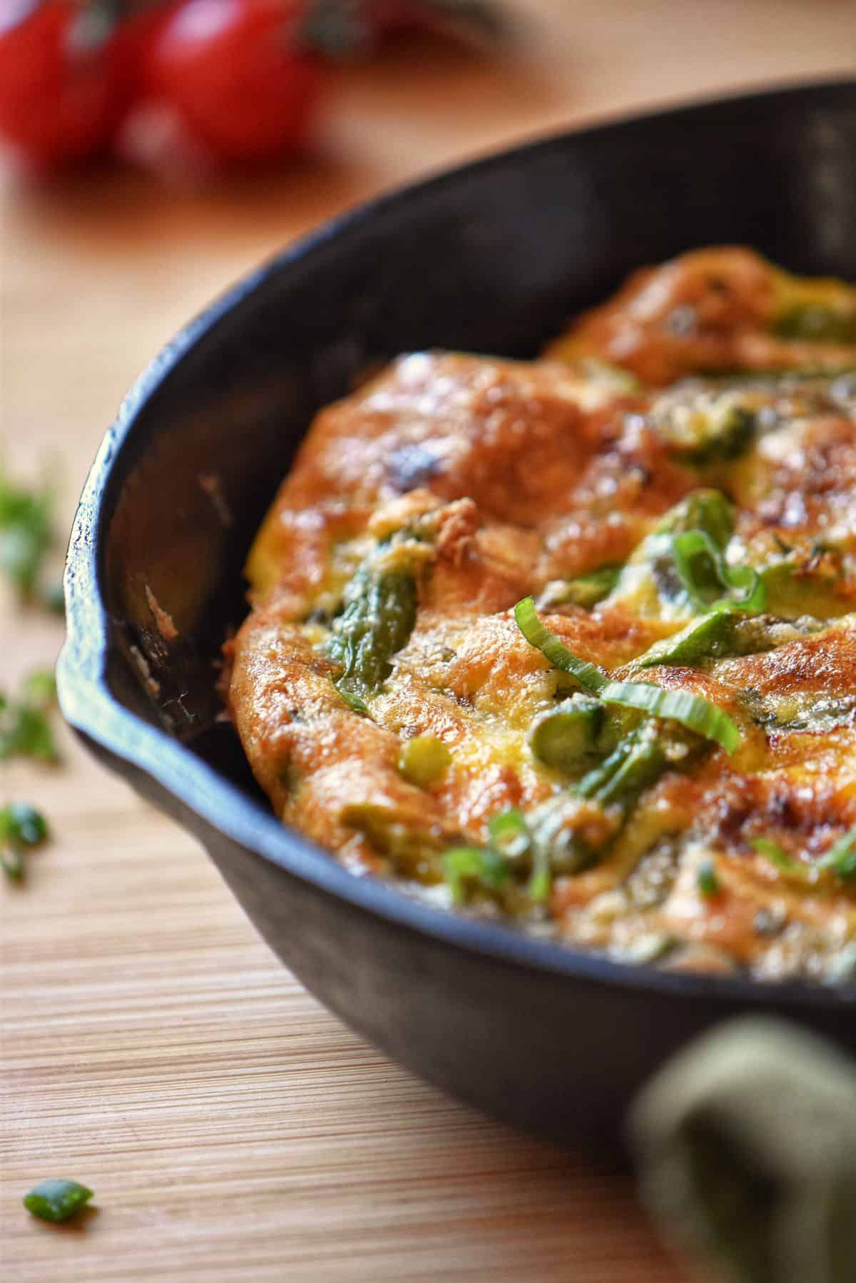 Asparagus frittata in a cast iron pan.