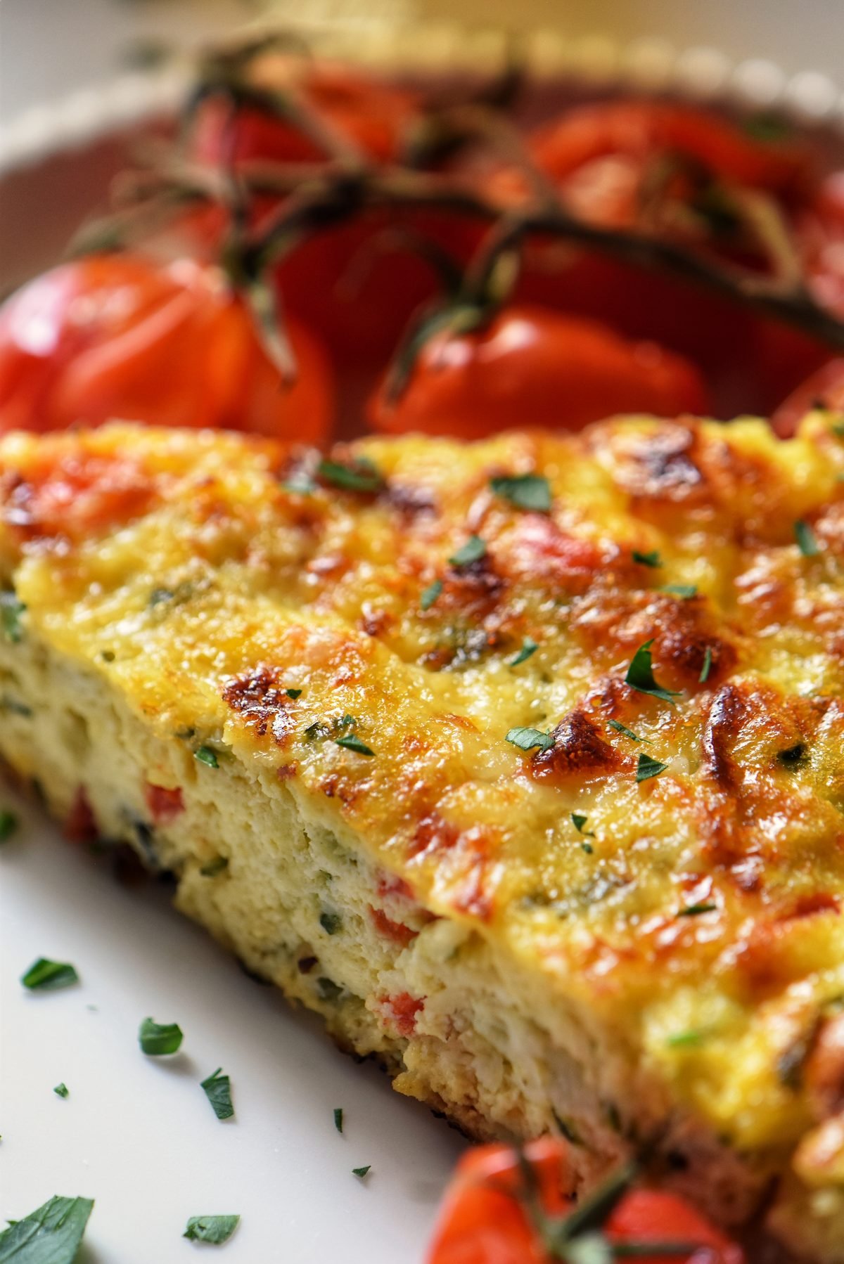 Zucchini Frittata on a white dinner plate