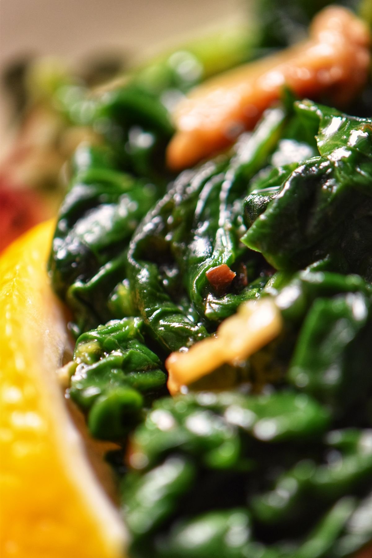 A close up photo of cooked spinach.