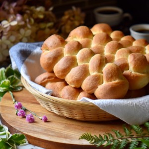 A braided sweet dough recipe in a wicker basket.
