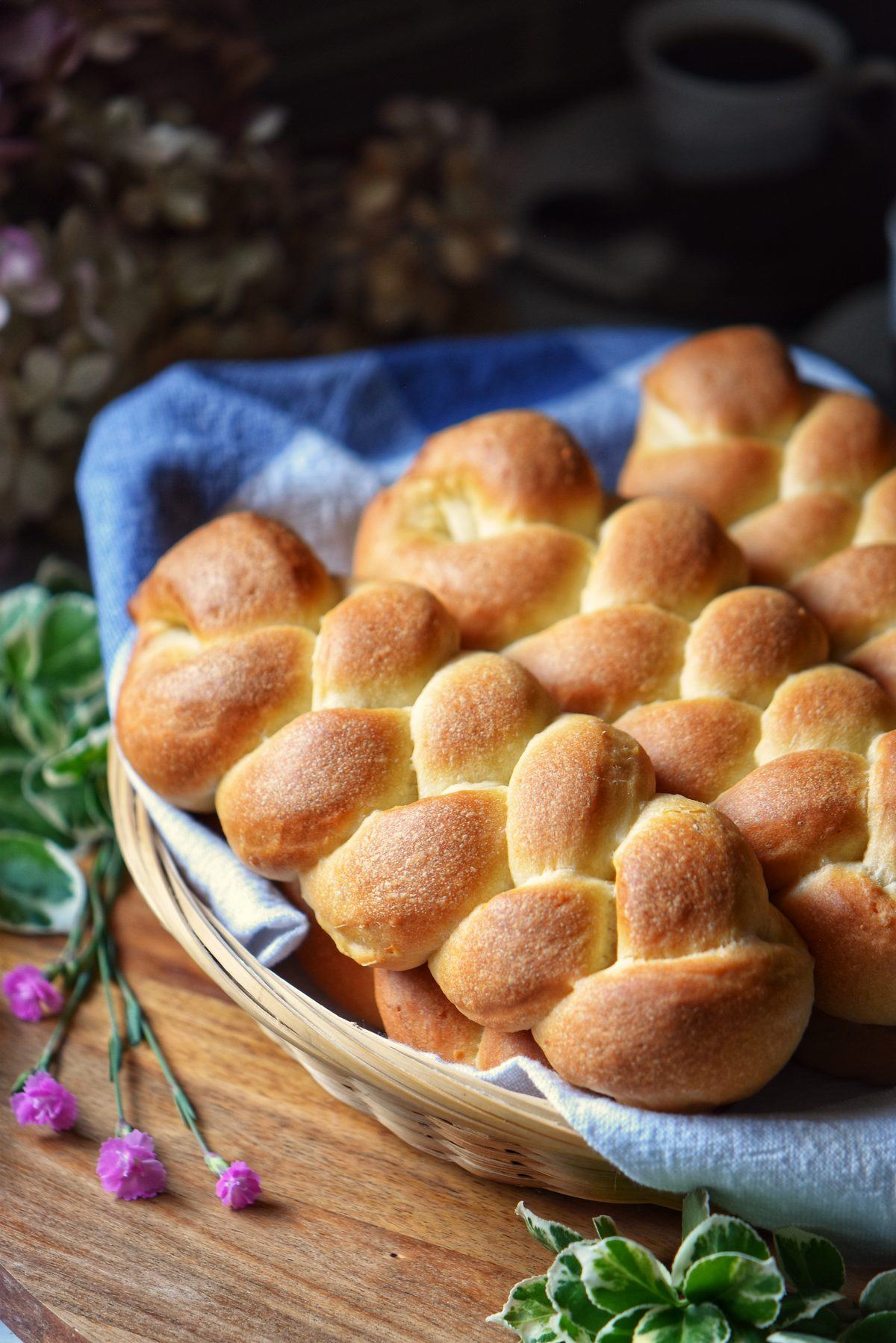 Braided sweet bread recipe in a wicker basket.