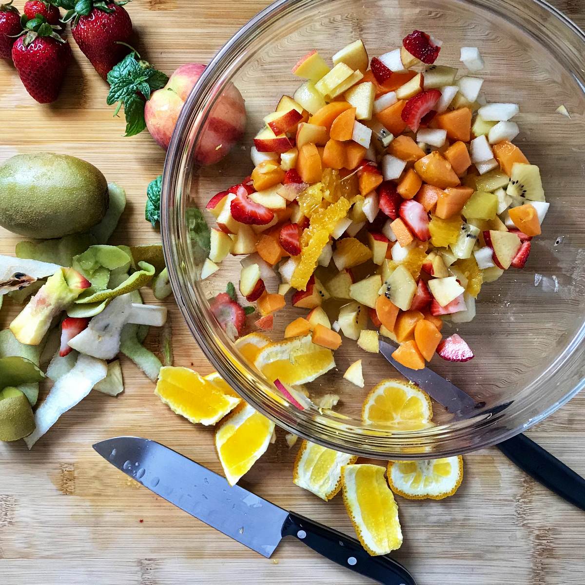 A bowl of cut up fresh fruit salad. 