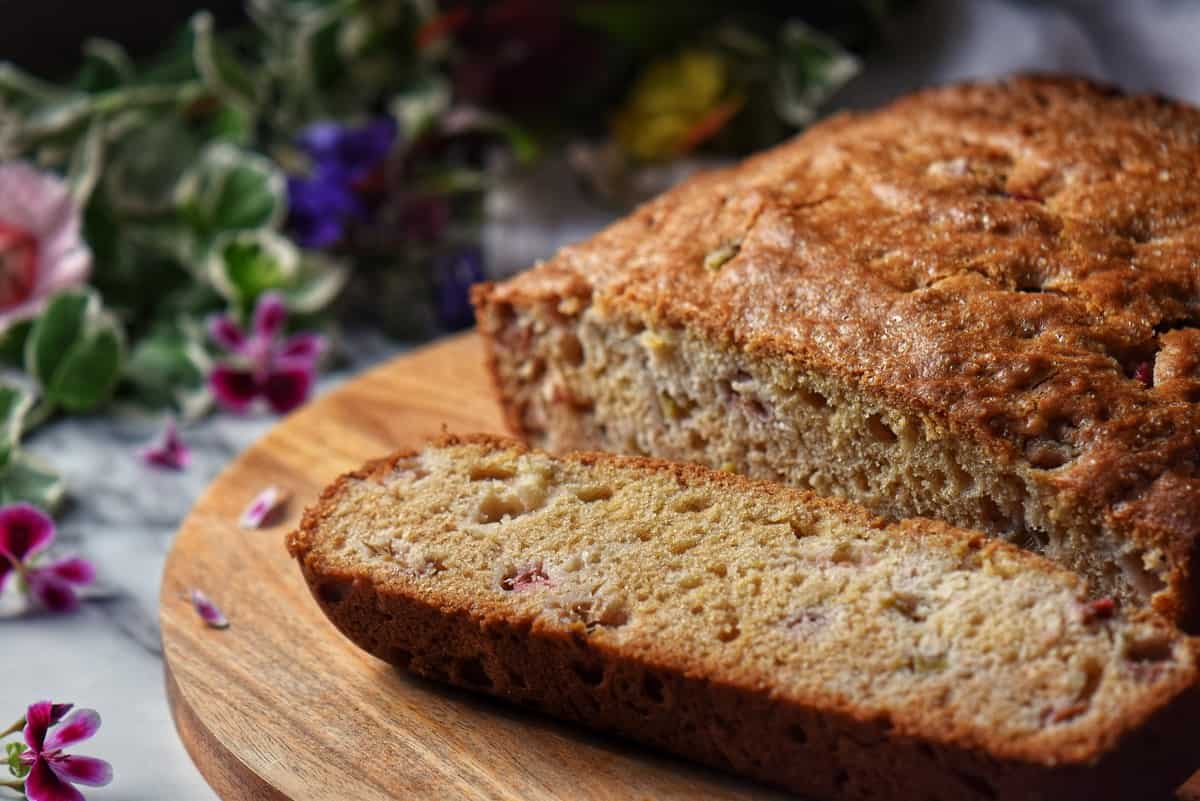 The tender crumb of rhubarb cake can be seen.