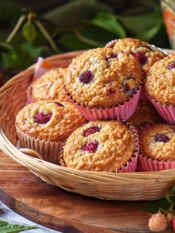 Raspberry muffins in a wicker basket.