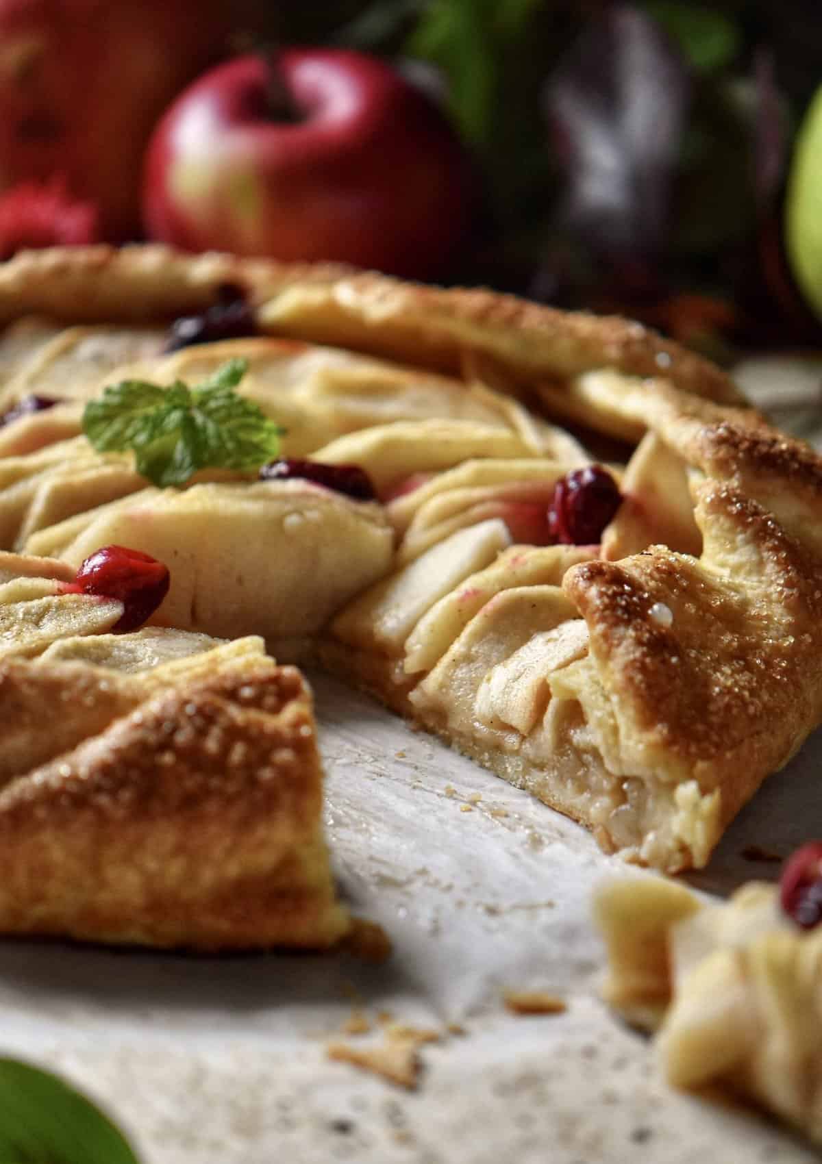 A slice of apple crostata missing from this Italian dessert. 