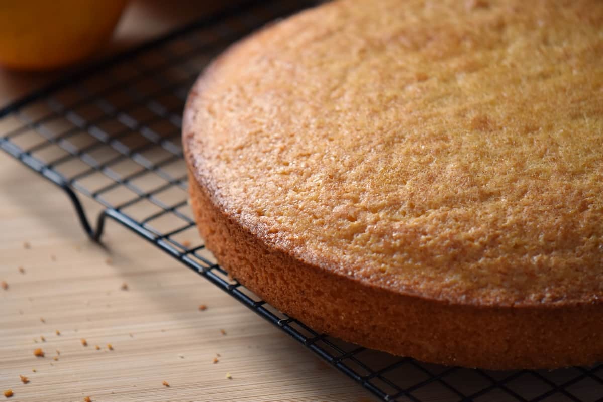 Unmolded cake on a cooling rack.