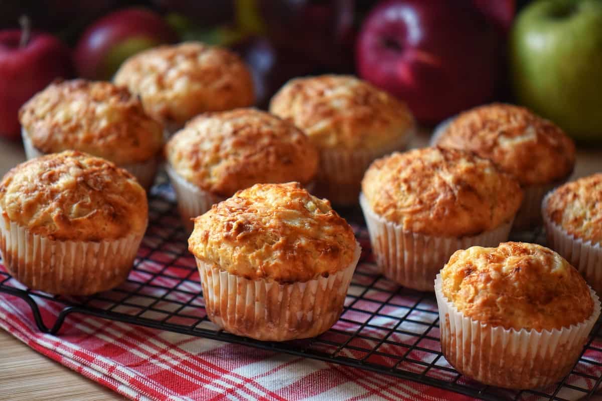 A few savory muffins on a cooling rack. 