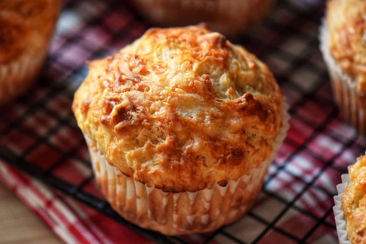 Savory muffins on a cooling rack. 