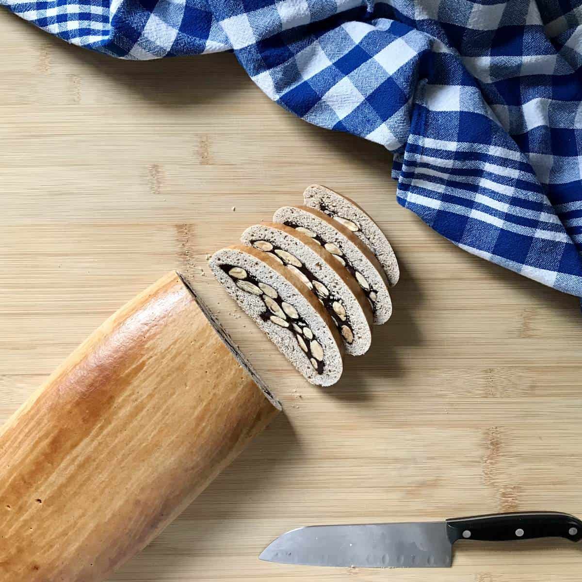 Sliced biscotti cookies on a wooden board.