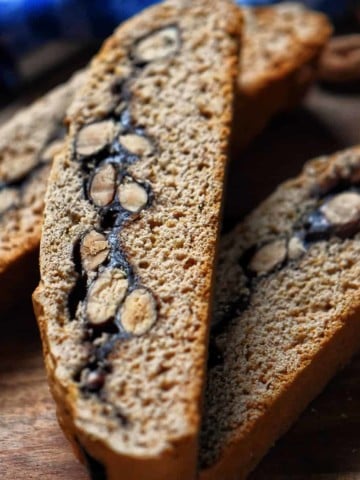 A sliced biscotti cookie with an almond and chocolate filling.