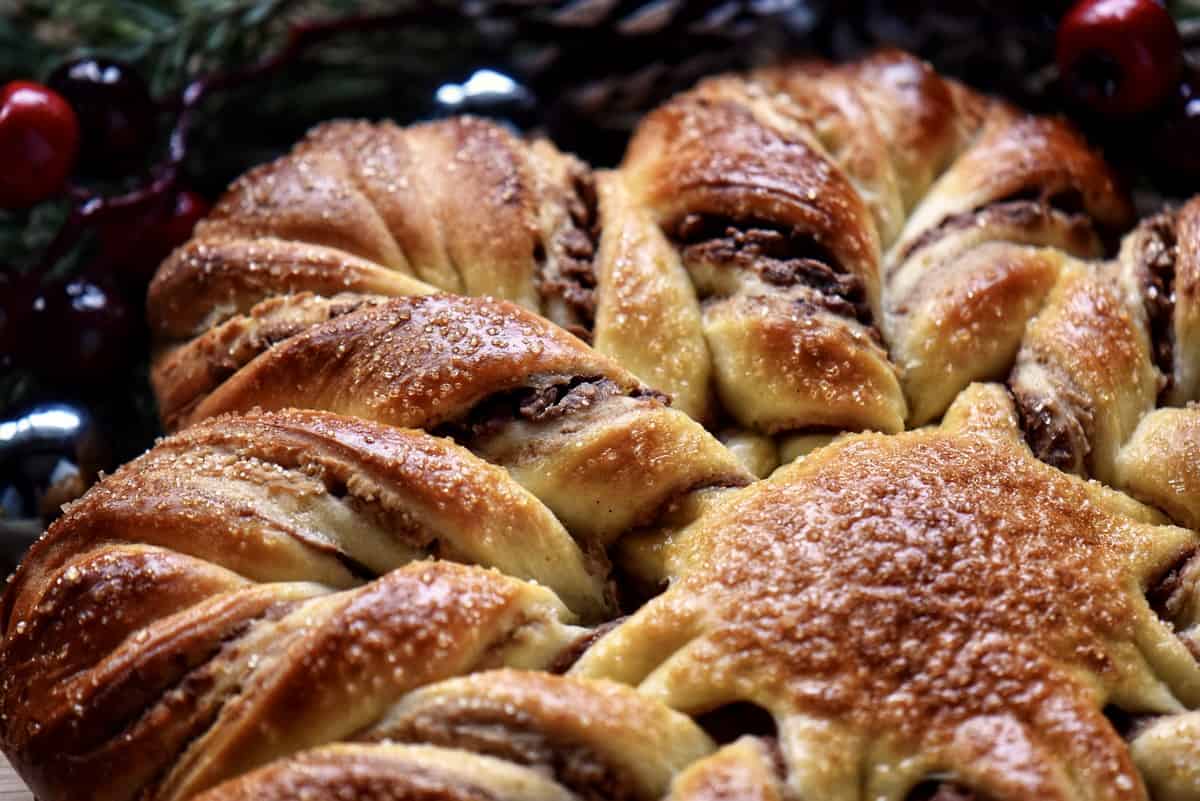 A close up photo of the chocolate chestnut filling of a star bread. 