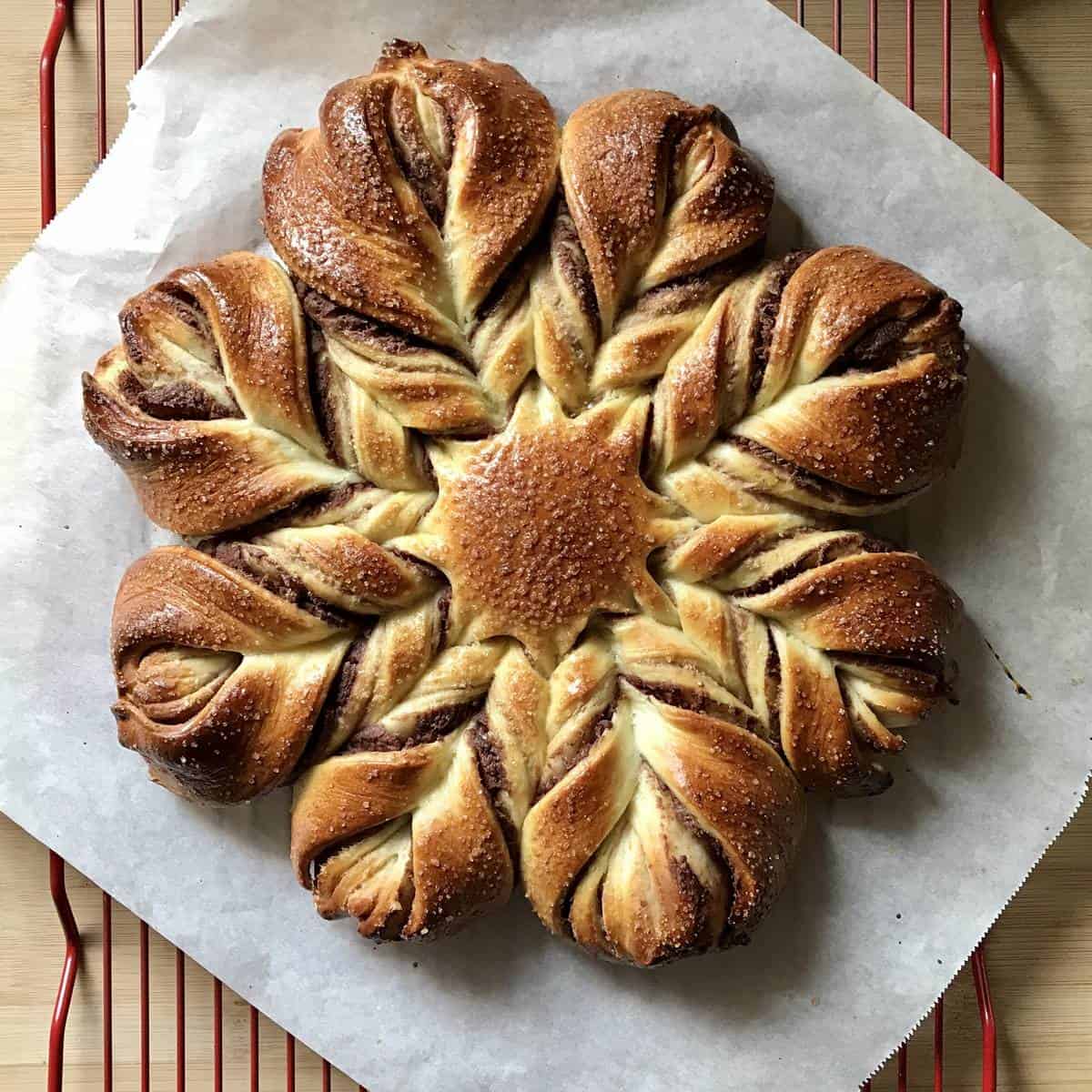 Star bread on a cooling rack.