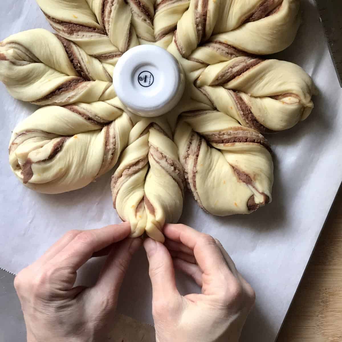 Star bread being formed. 