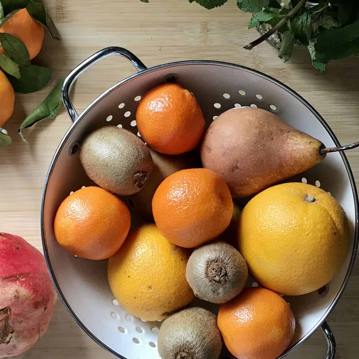 Winter fruits in a colander. 