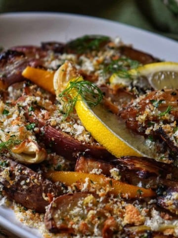 Potato Fennel Gratin in a white serving platter.