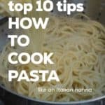 Spaghetti being drained in a colander.