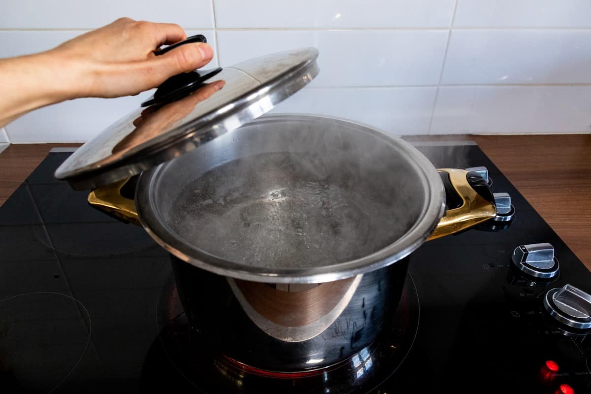 A large pot of boiling water.