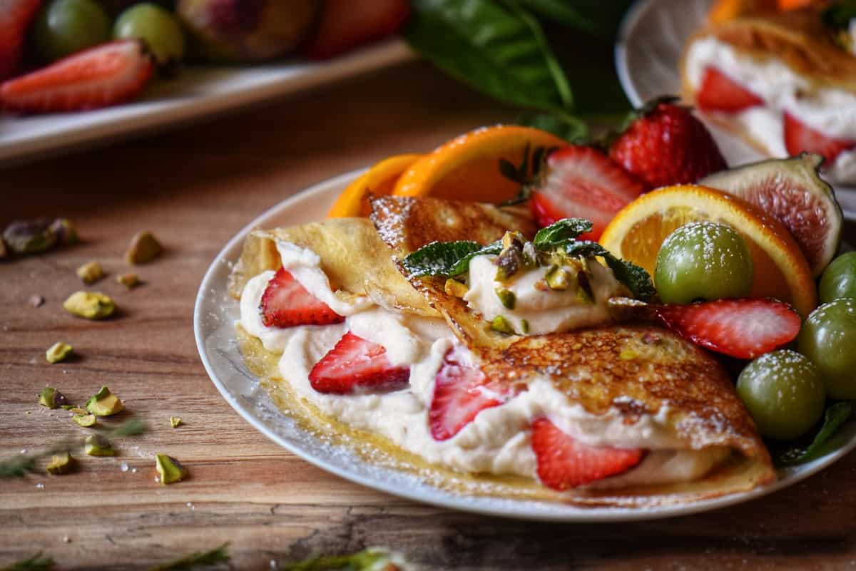 Ricotta filled crepes with fruit.