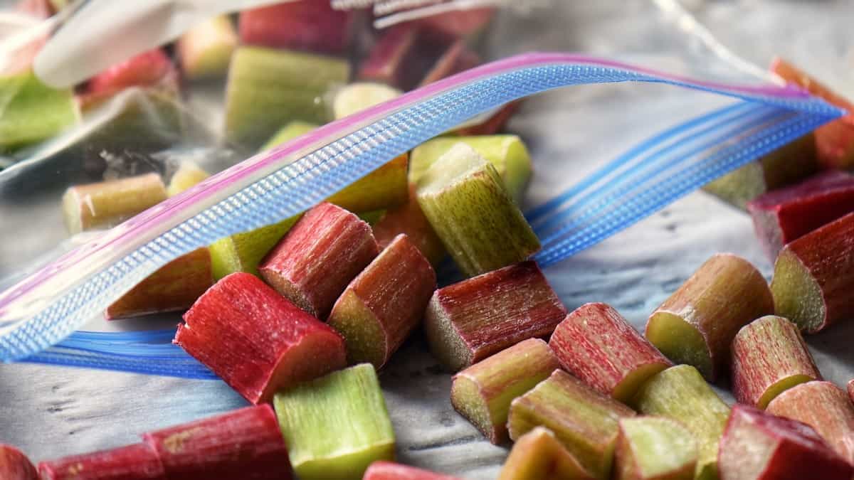 Diced rhubarb next to a Ziploc bag. 