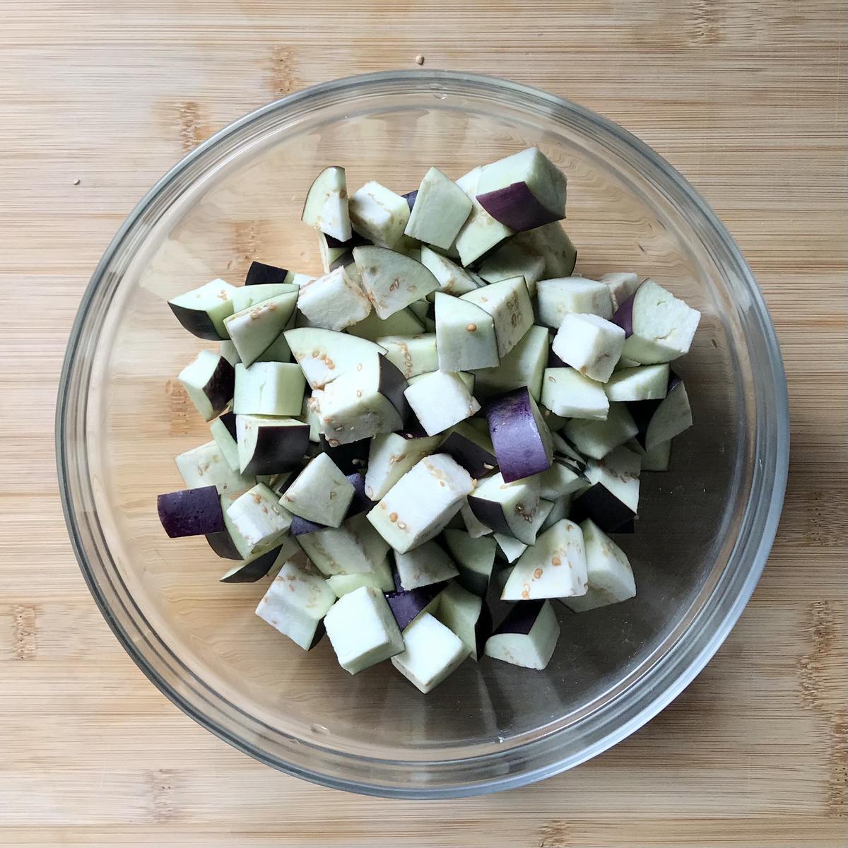 Diced eggplant in a bowl.