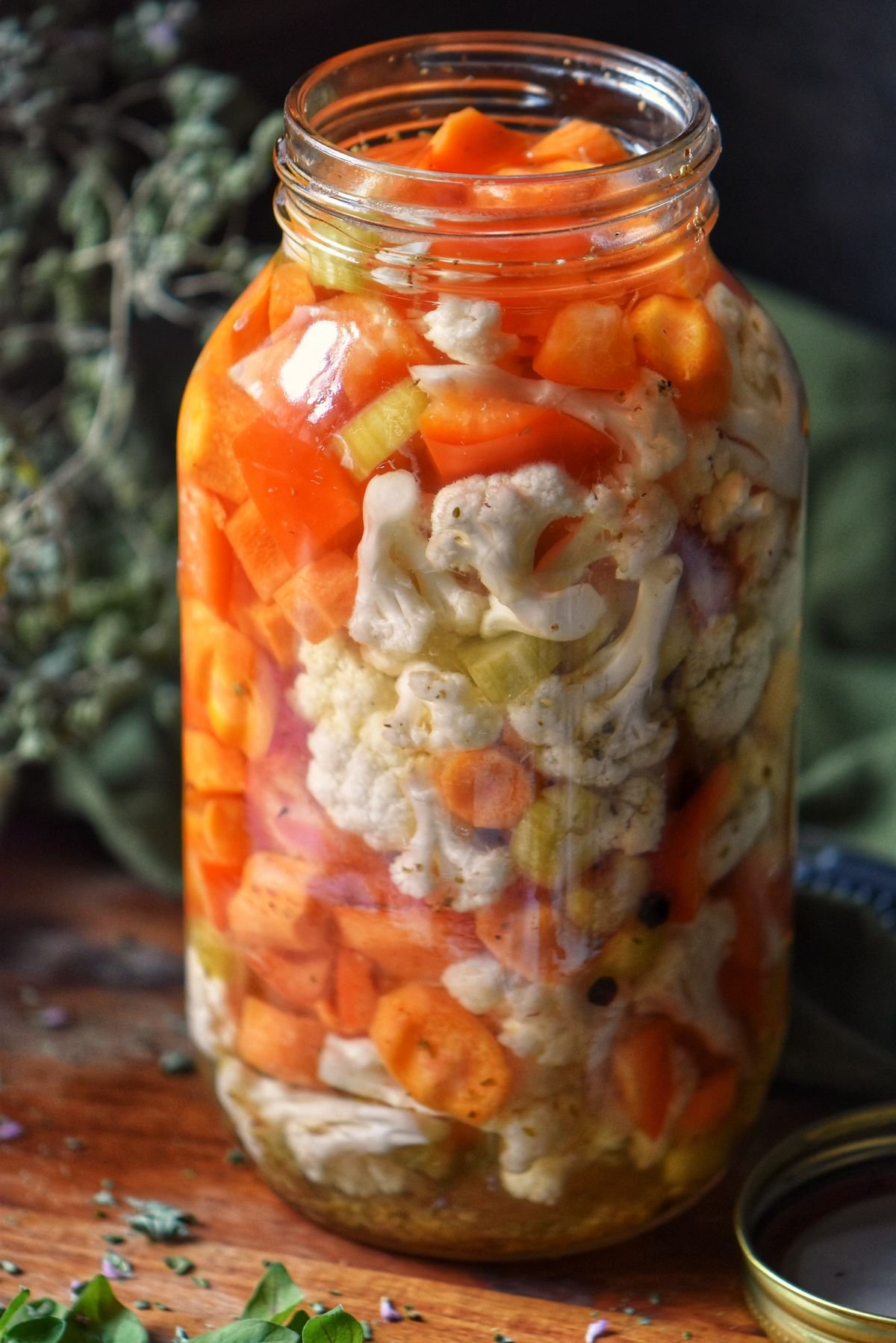 A mason jar of Italian giardiniera.