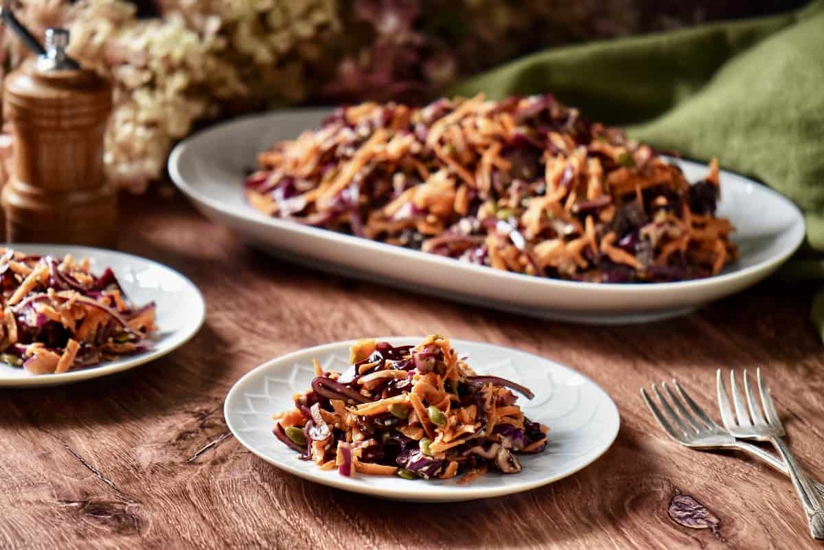 Cabbage and carrot slaw on a plate.