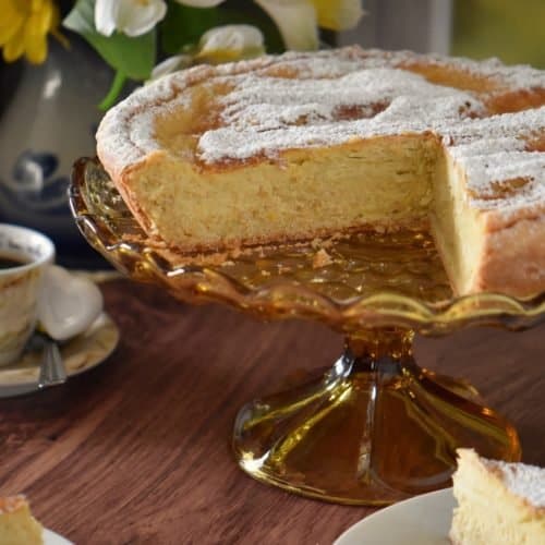 Italian Easter Grain Pie on a cake stand.