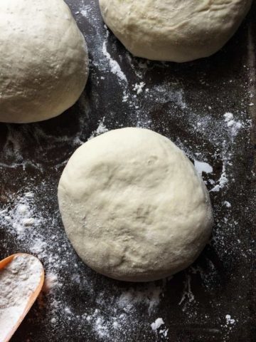 Balls of pizza dough ready to be stretched.