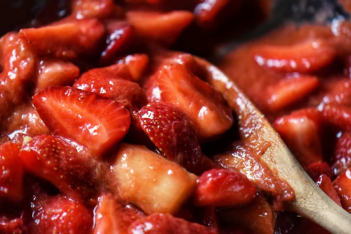 Strawberry rhubarb compote in a pan.
