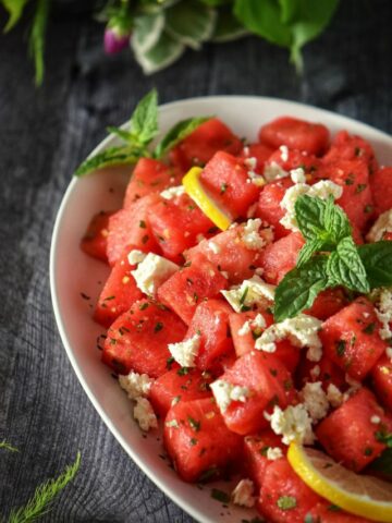 Watermelon feta salad in a white serving dish.