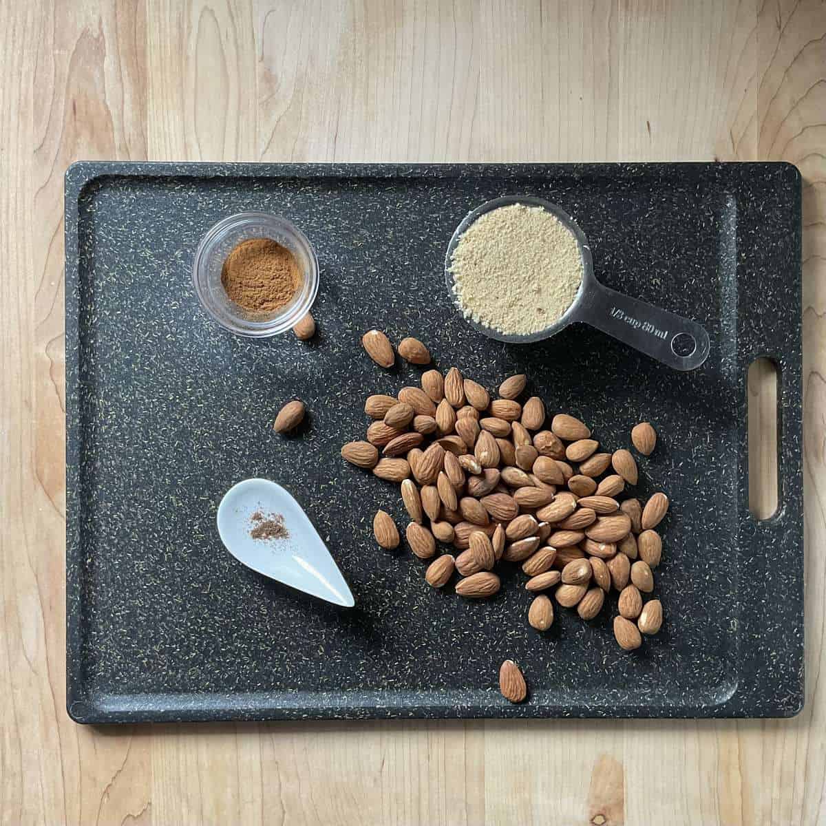 The ingredients to make the nut mixture on a cutting board.
