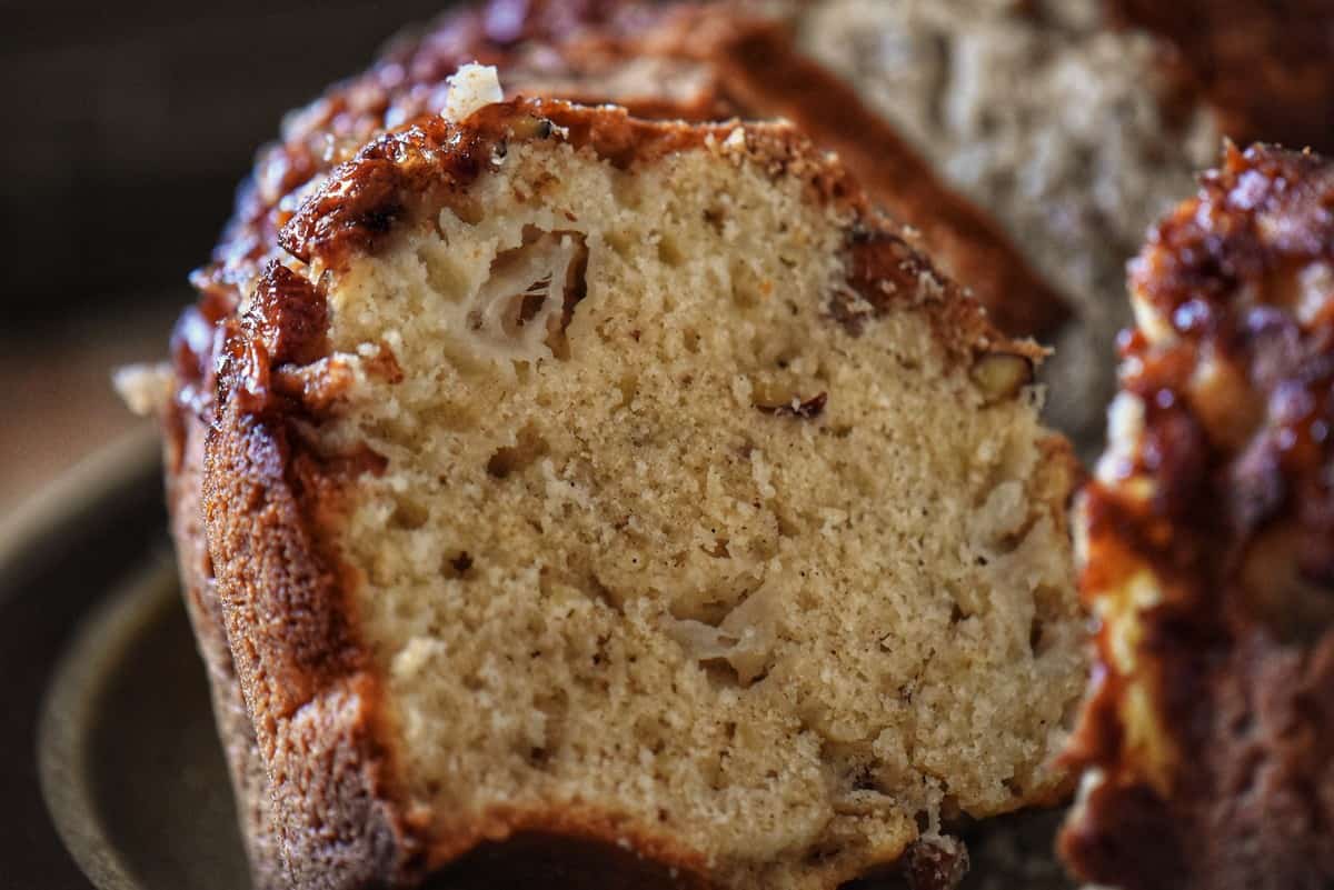 The tender crumb of a bundt cake made with apples.