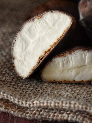 The creamy white interior of a chestnut.